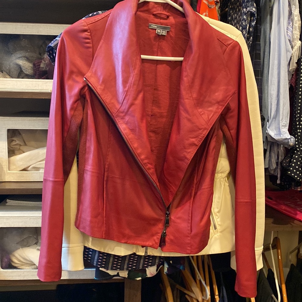 Rich red leather jacket. Soft and buttery. Nearly new with no signs of wear.